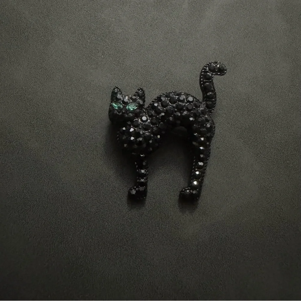 Monet Black Crystal Cat Pin with Emerald Green Eyes